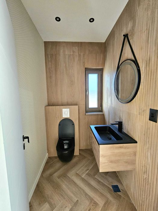 Casă modernă exclusivistă 
, fațadă ventilată HPL 
Varianta Craiovei