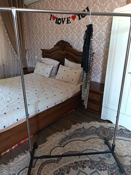 Bolalar va kattalar kiymini ilish uchun sushilka