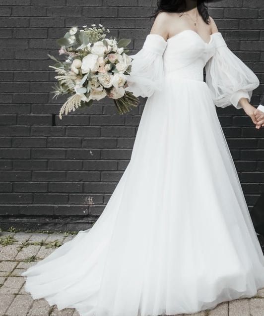 Изысканное свадебное платье