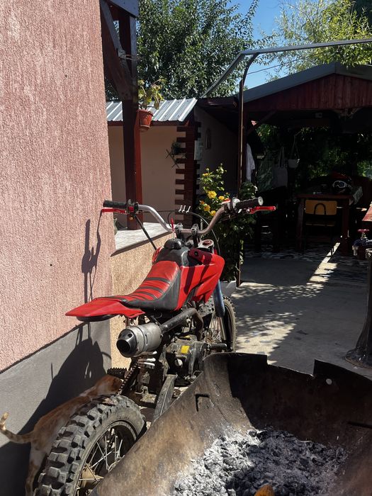 Vand cross kxd de 125cc (CITITI DESCRIEREA)