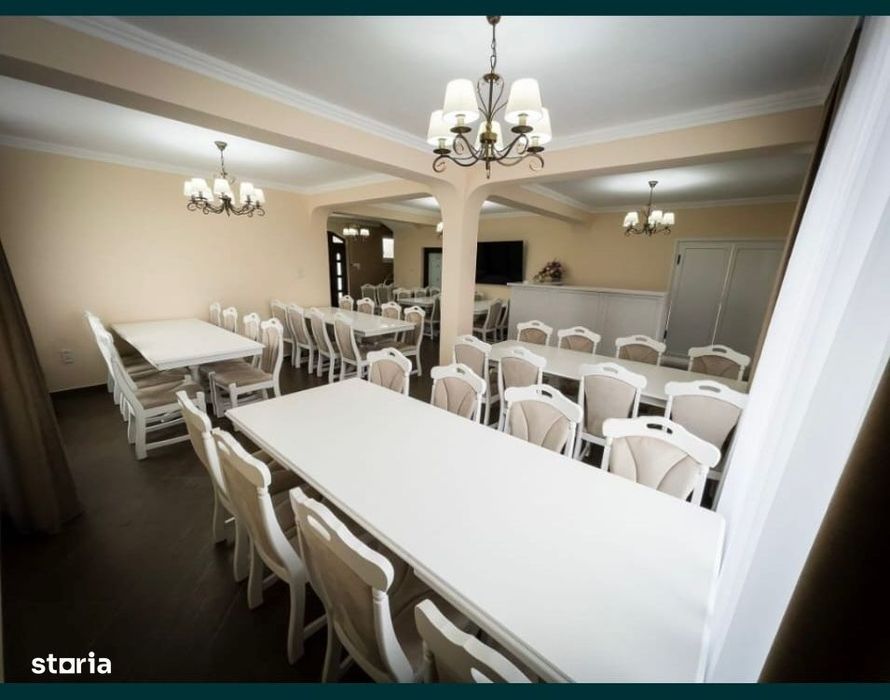 Casă cu 8 camere, curte imprejmuită, urbană