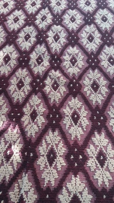 Macate tesute din lana moale.