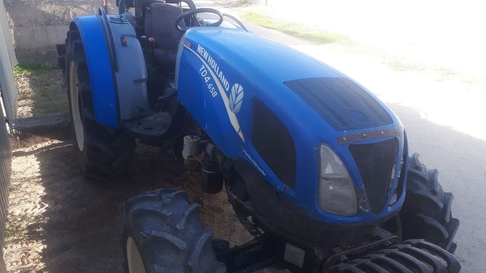 Трактор сотилади  невхоленд