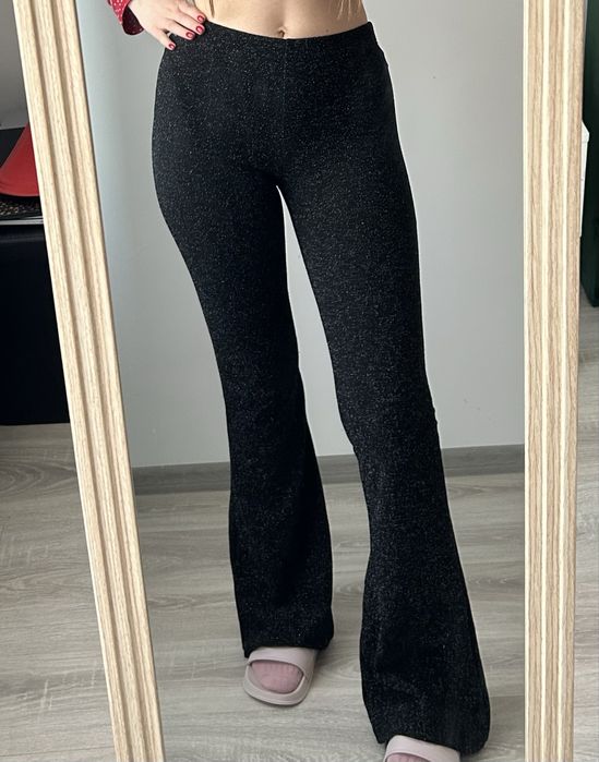 Pantaloni evazati cu sclipici Pull&Bear