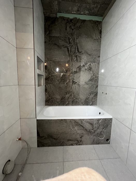 Опытный кафельщик