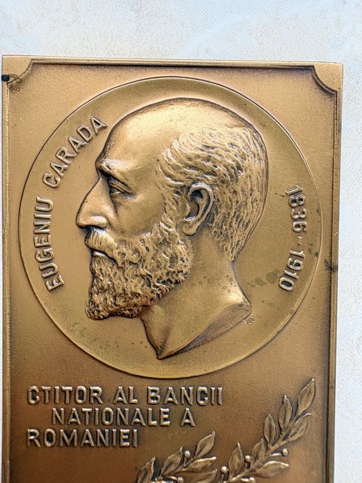 Vând plachetă aniversară din bronz, emisă de Banca Națională a României în anul 1995, cu ocazia împlinirii a 115 ani de la înființarea instituției.