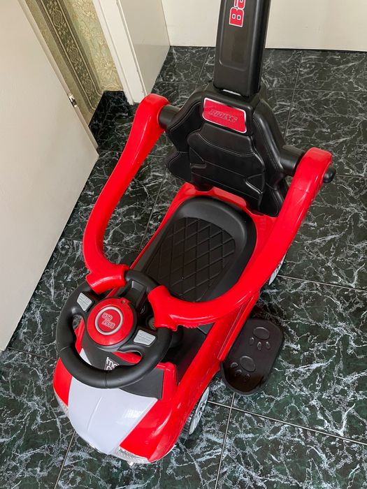 Кола за бутане с дръжка Moni Rider Червена