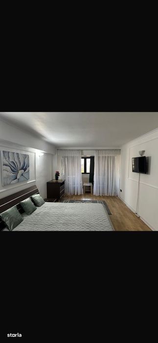 De închiriat apartament 2 camere ultracentral, loc de parcare inclus .