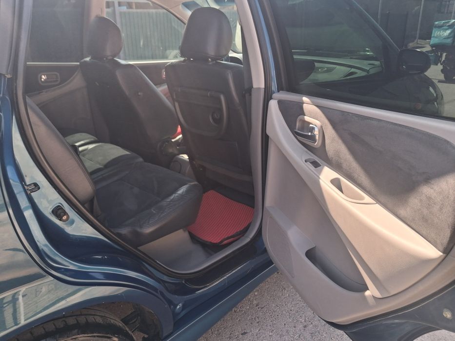 Ниссан алмера тино