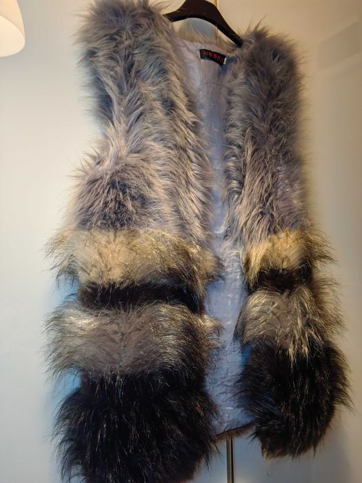 Дамски пухен елек