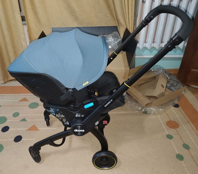 Новая коляска doona