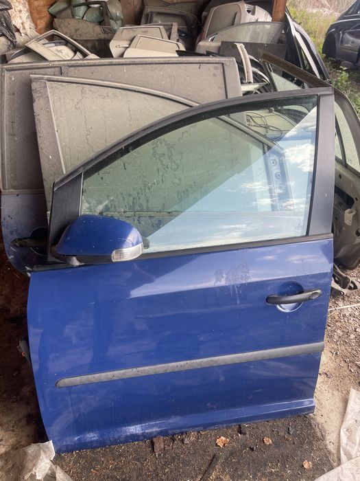 Usa stanga  fata touran albastru 04-2010
