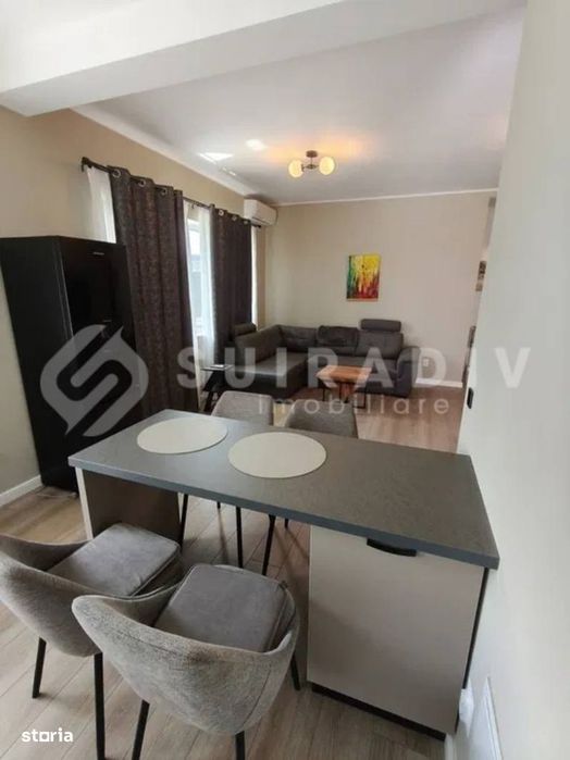 Apartament modern, curte proprie, parcare- zona Ira