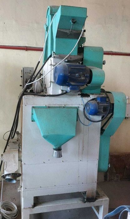 Машина за белене на ориз