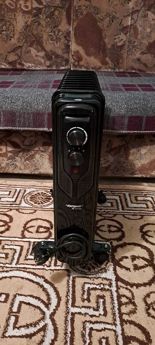 Calorifer electric pe ulei Voltomat Heating 2500W, 9 elementi