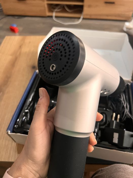 масажен пистолет