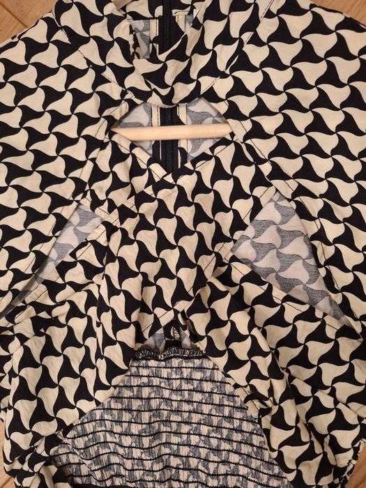 Екстравагантна блуза