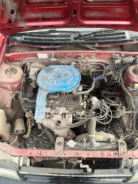 Машина Mazda 323