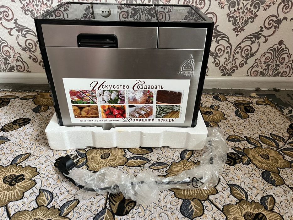 Хлебопечь продам Binotone