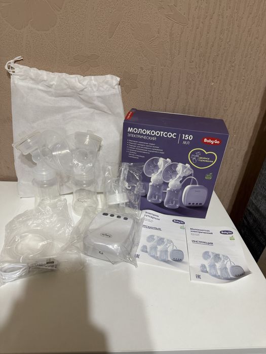 Подогреватель стерилизатор и молокоотсос