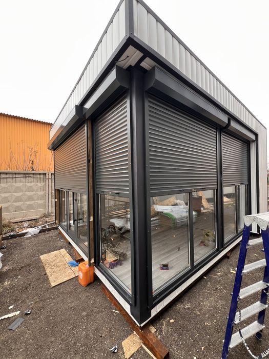 Рольставни , Секционые ворота