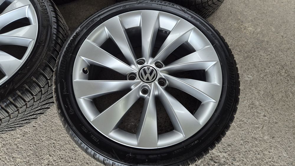 VW 18 цола 5x112 8J ET41 ц.о.57.1  със зимни гуми 235 40 18 Bridgeston