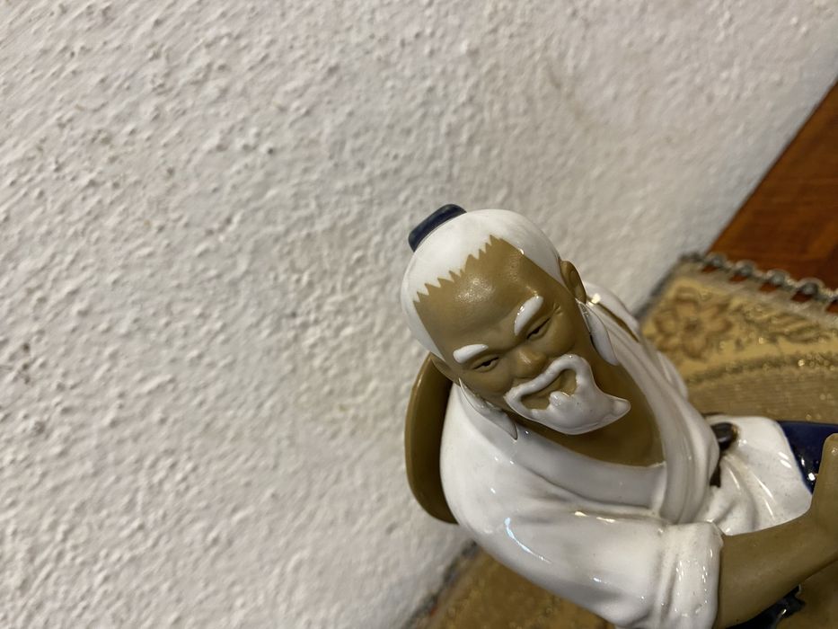 Стари азиятски фигури рибари