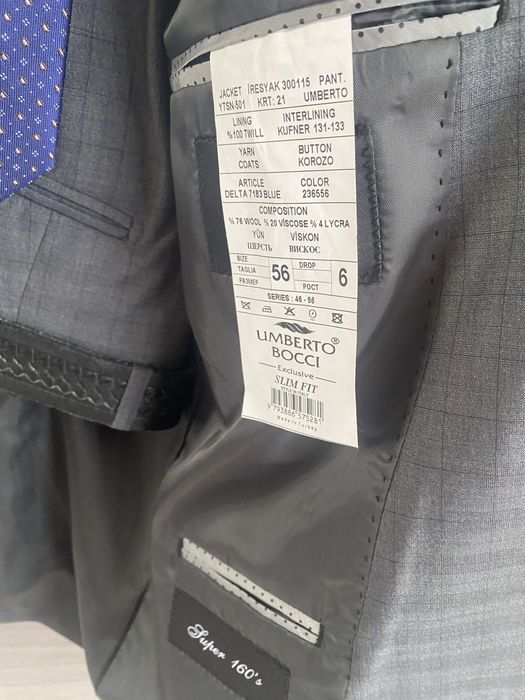 Продам новый костюм