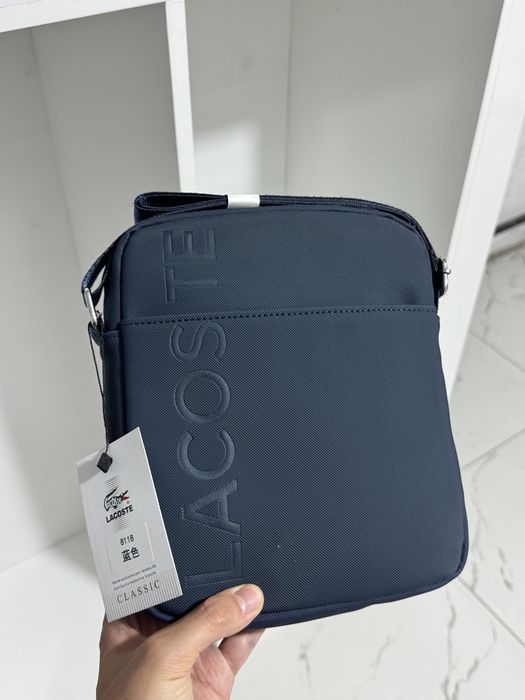 Барсетки Lacoste в черным и синем цвете