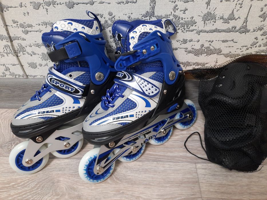 Роликовые коньки