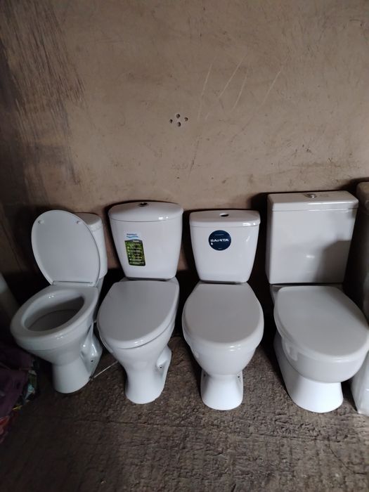 Продам  унитаз с бочком