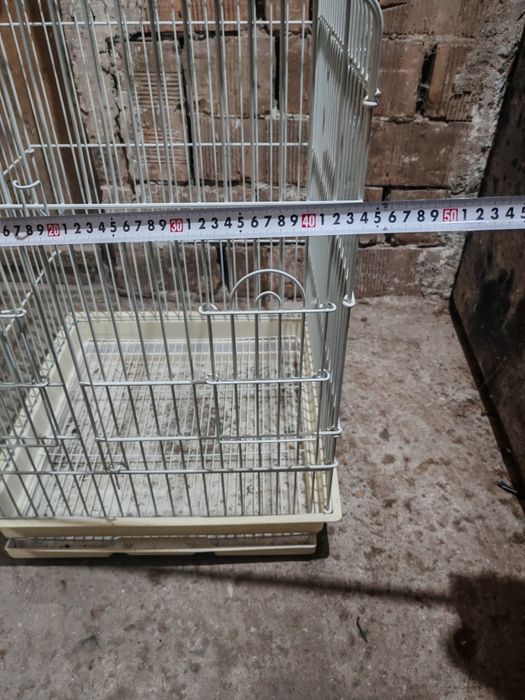 продавам клетки за Папагал бялата  другите