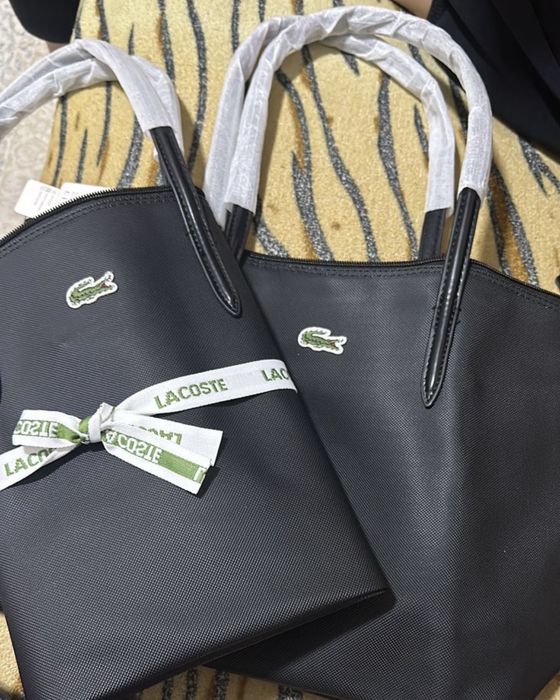 Продаю 2 новые Сумки Lacoste темно синяя/чёрная