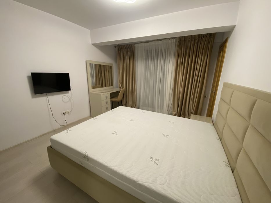 Inchiriez apartament 3 cam 95 mp bloc nou+loc parcare subteran