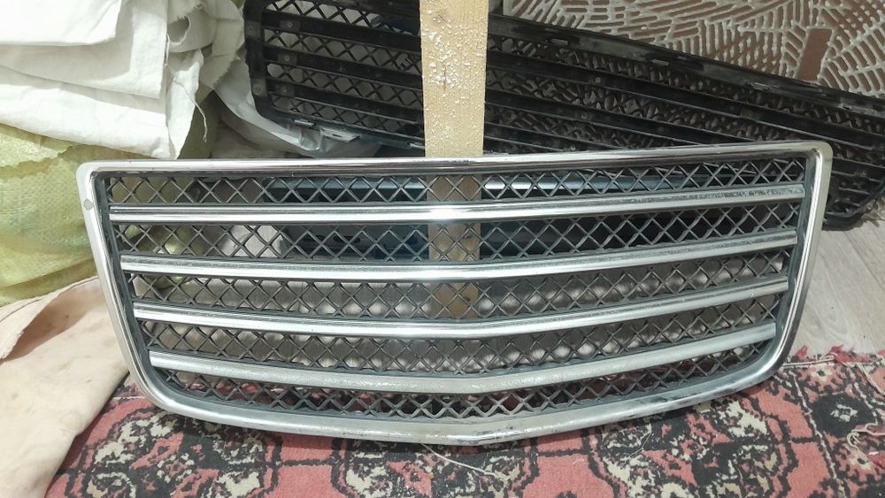 Облицовка нексия 3 га б/у холатда трешина  чизилган жойлари йок