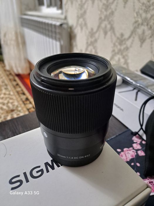 Обьективы Sigma 30mm 1.4