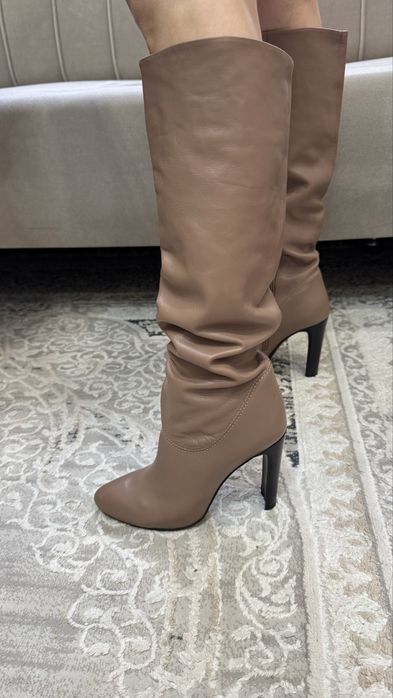 Продам новые сапоги