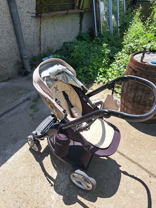 Бебешка количка X-lander с много подаръци към нея