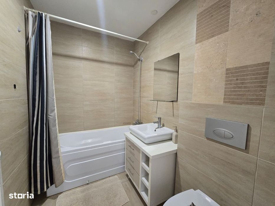 COSMOPOLIS - Apartament cu 2 camere tip studio, mobilat si utilat.