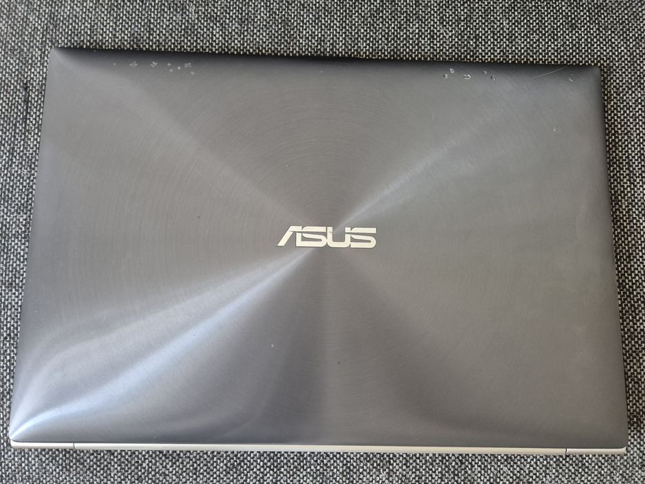 vand laptop Asus UX31E..14"..i5..Ssd 128 Gb..f. subtire..carcasa metal