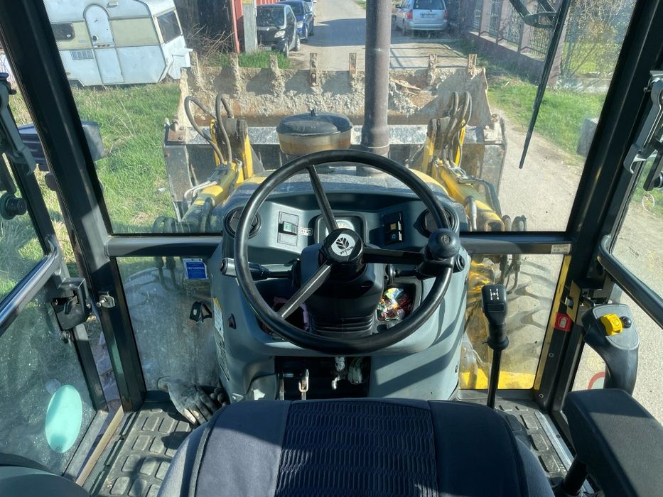 Buldoexcavator New Holland 2012 factura TVA