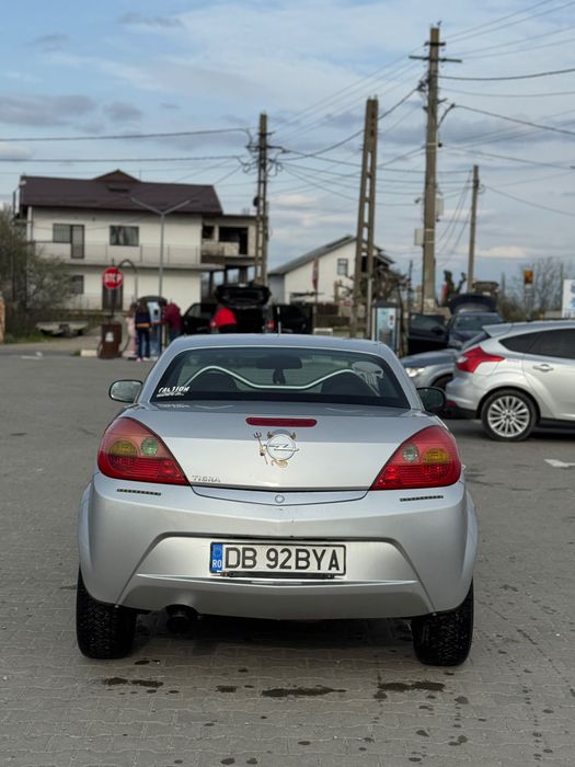 Vând Opel Tigra.