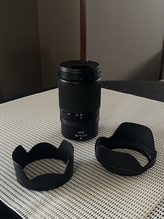 Обектив Nikkor 28-75 mm f/2.8 неразличим от нов
