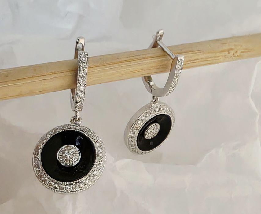 Золотые серьги производство Италия