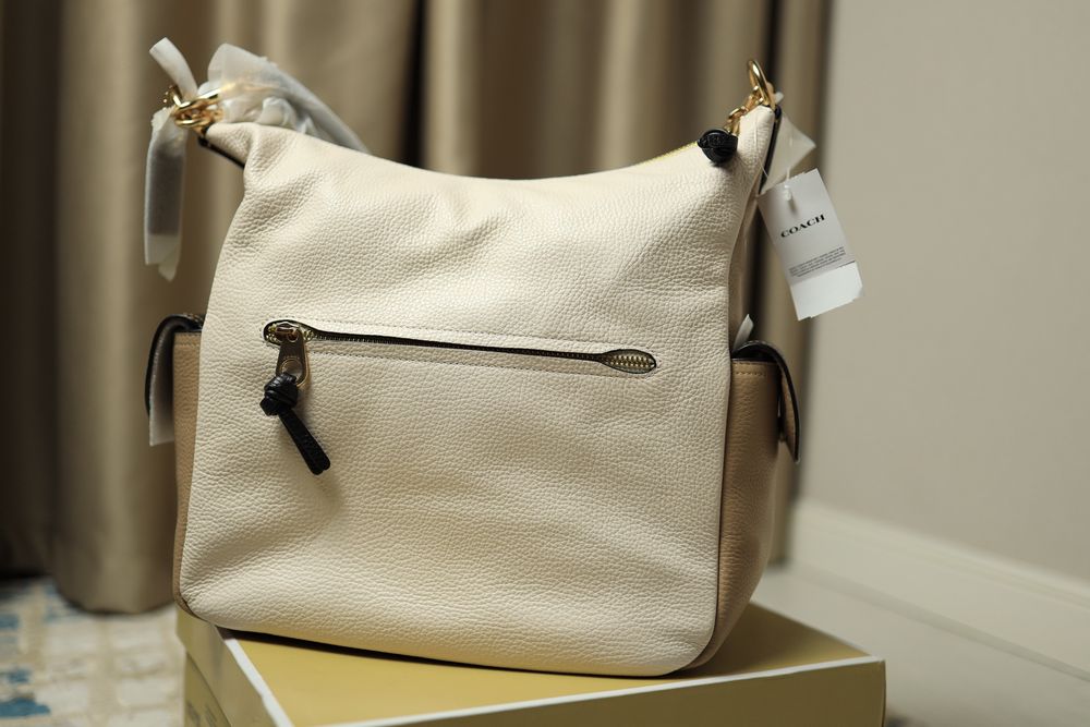 Продам новую кожанную сумку Coach