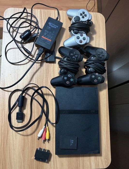 Playstation 2 Slim + 3 Controllers + AV>VGA Adaptor + 64mb Memory Card