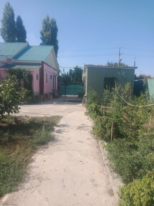 дом  находится по улице байзак батыра 277