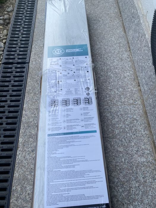 2 cutii sigilate - parchet laminat Uniclic - gri