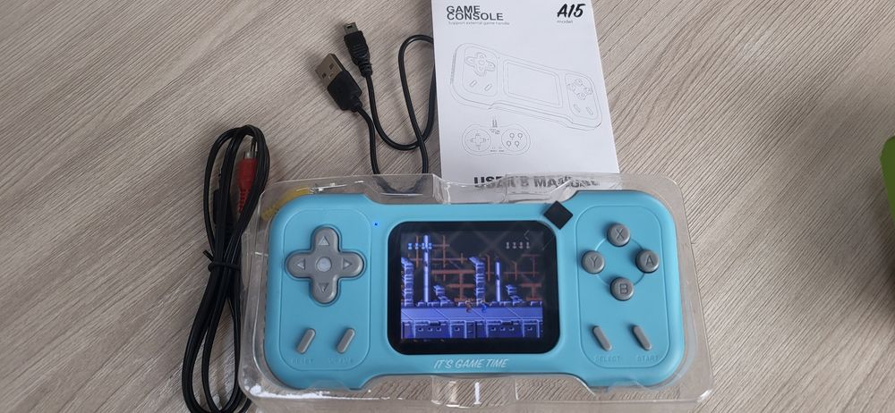 Денди  Мини . Можно играть с телевизора