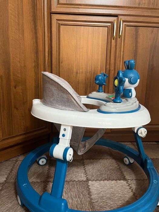 Детский ходунок новый